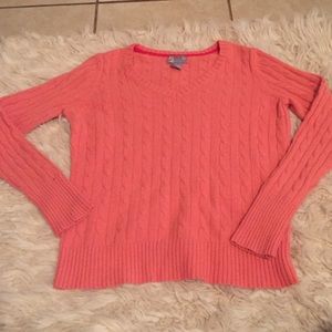 Large orange-pink sweater